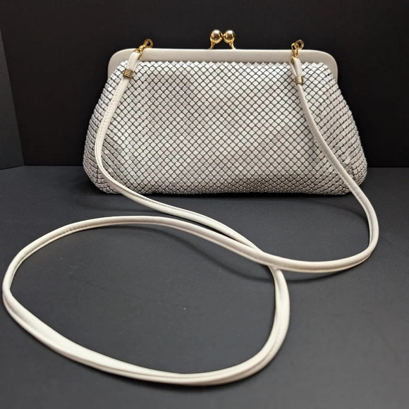 Whiting & Davis Handbags - Whiting & Davis White Mesh Small Evening Bag with Strap and Clasp closure .